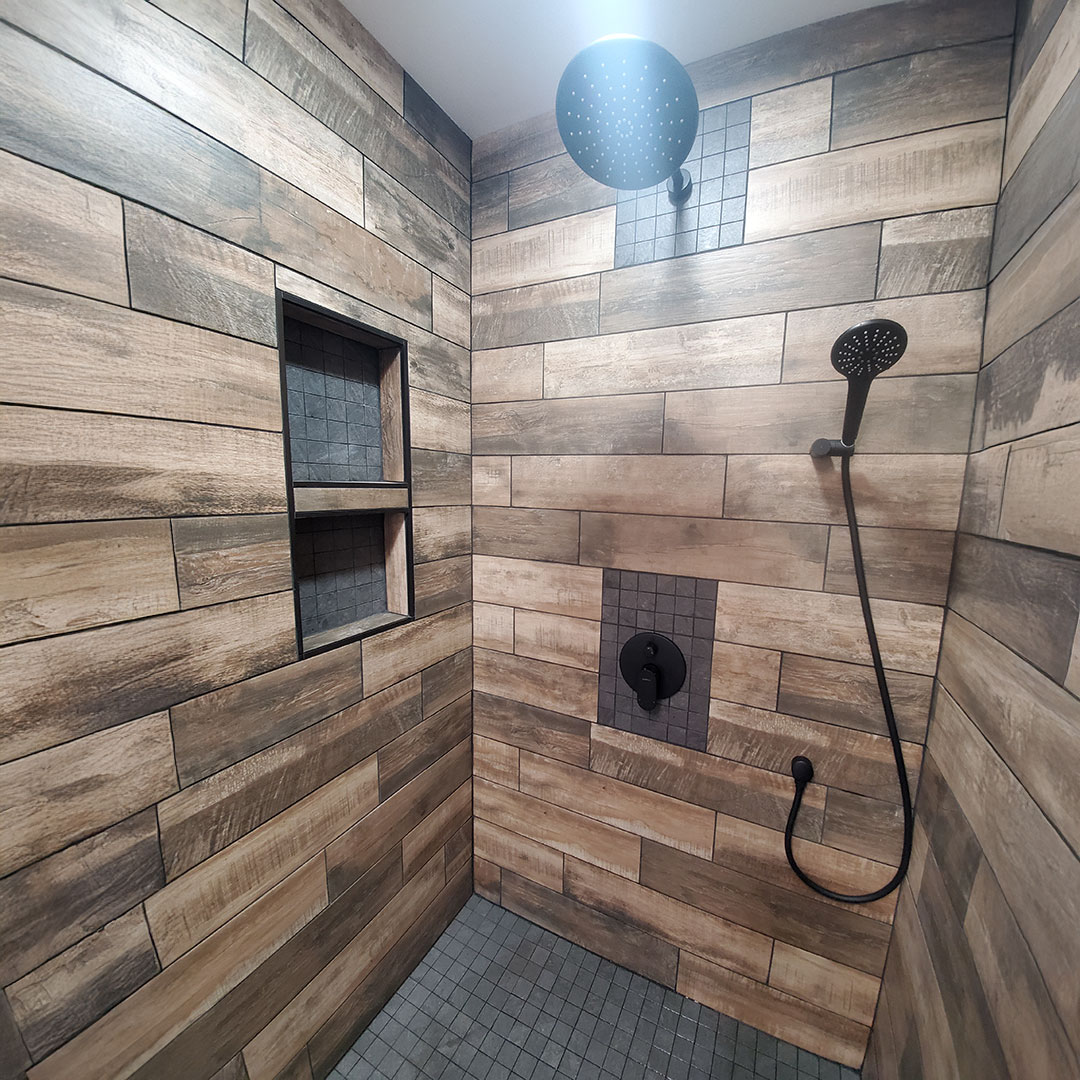 bathroom remodel showing tile floor and shower