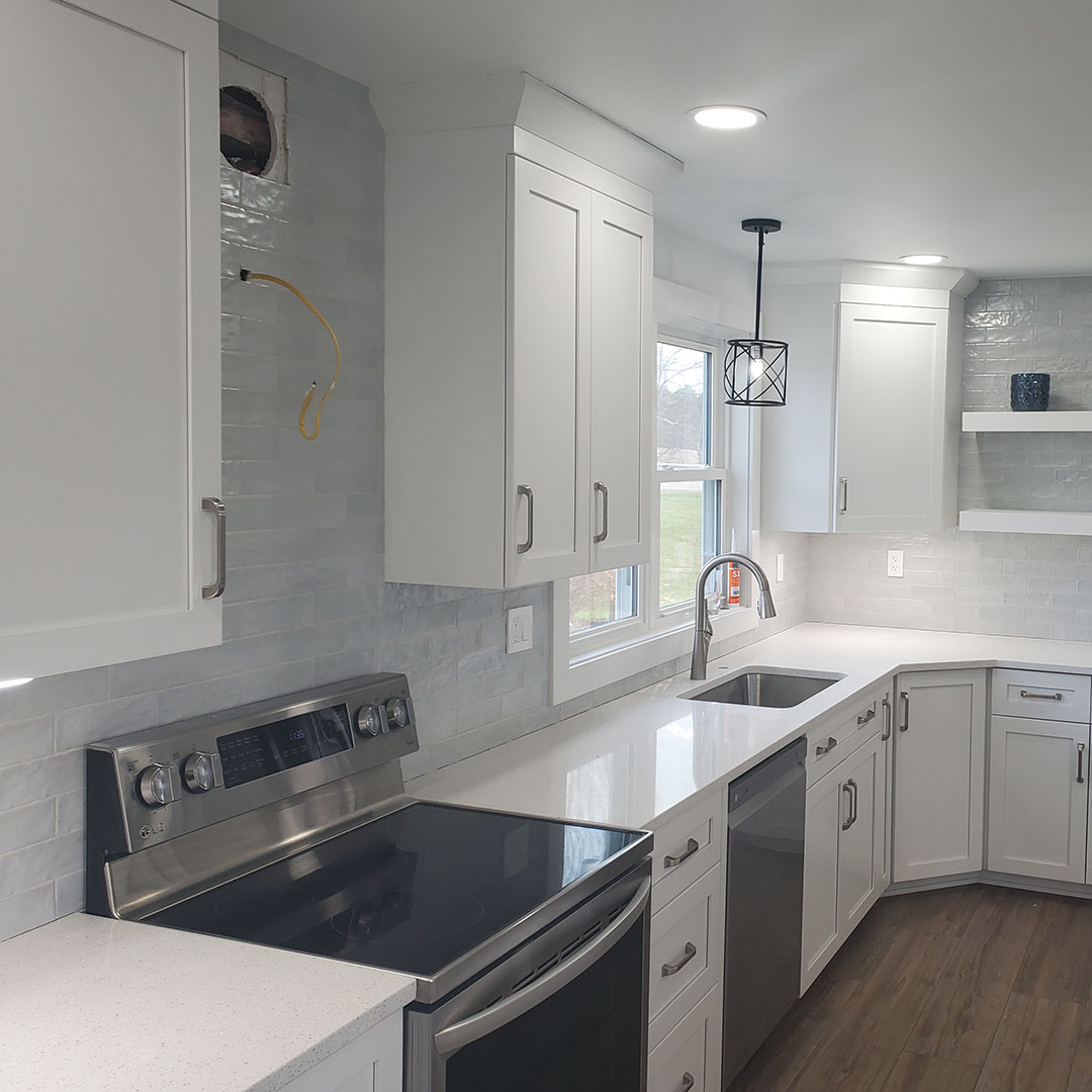 modern kitchen remodel with tile backsplash